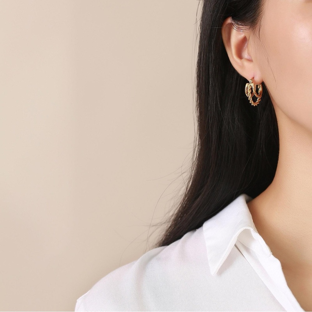 Three Gold Hoop Earrings